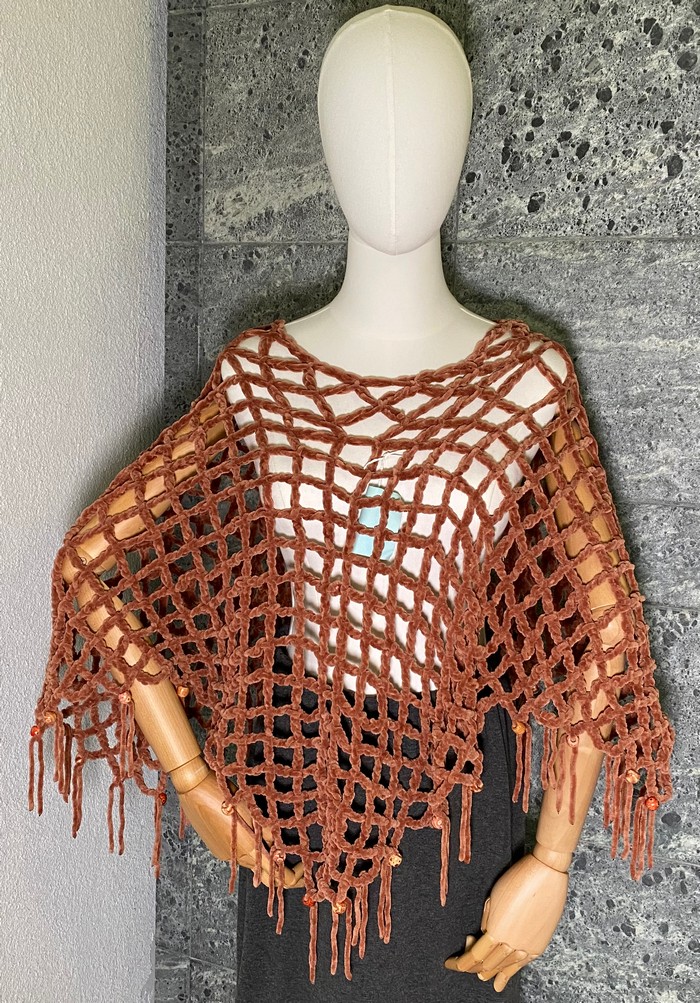 Punaruskea poncho