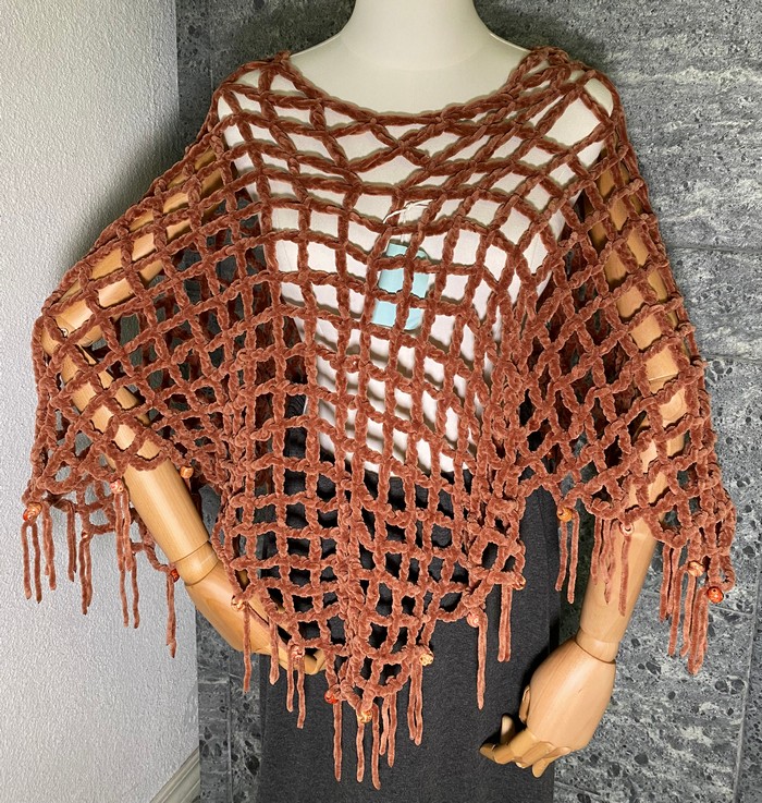 Kösinvirkattu poncho